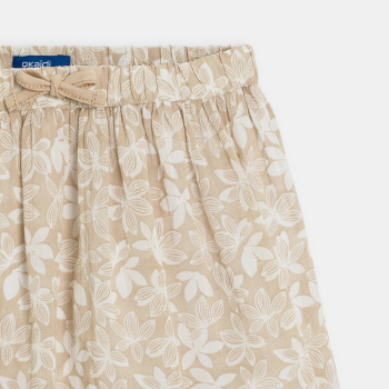 تنورة بيج اللون مطبوعة وبها...